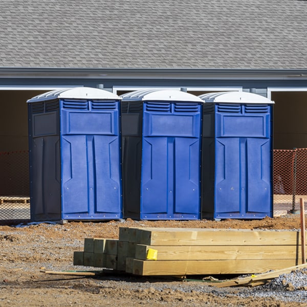 how often are the porta potties cleaned and serviced during a rental period in Acton